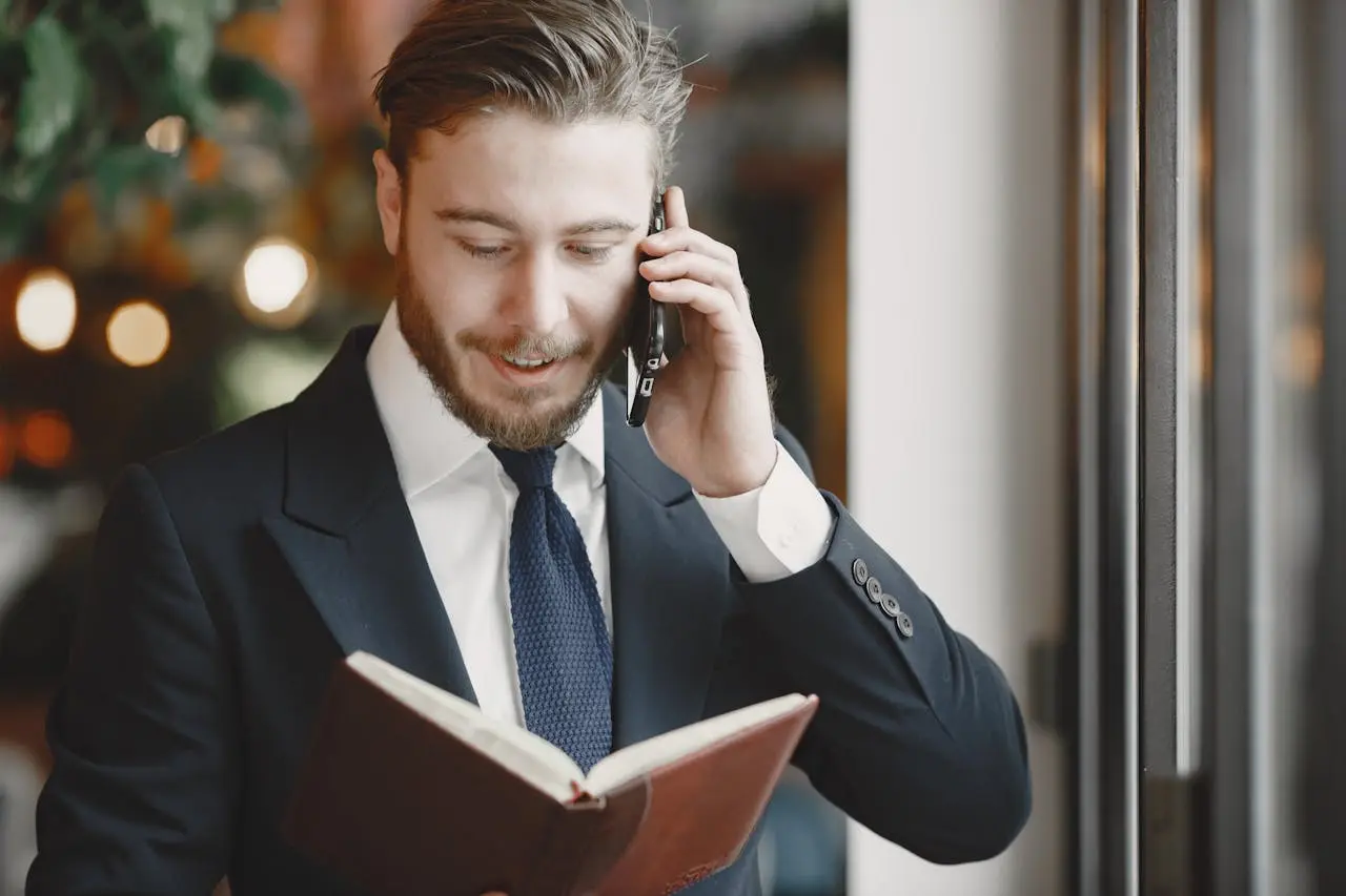 Business professional reading live intelligence alerts on phone